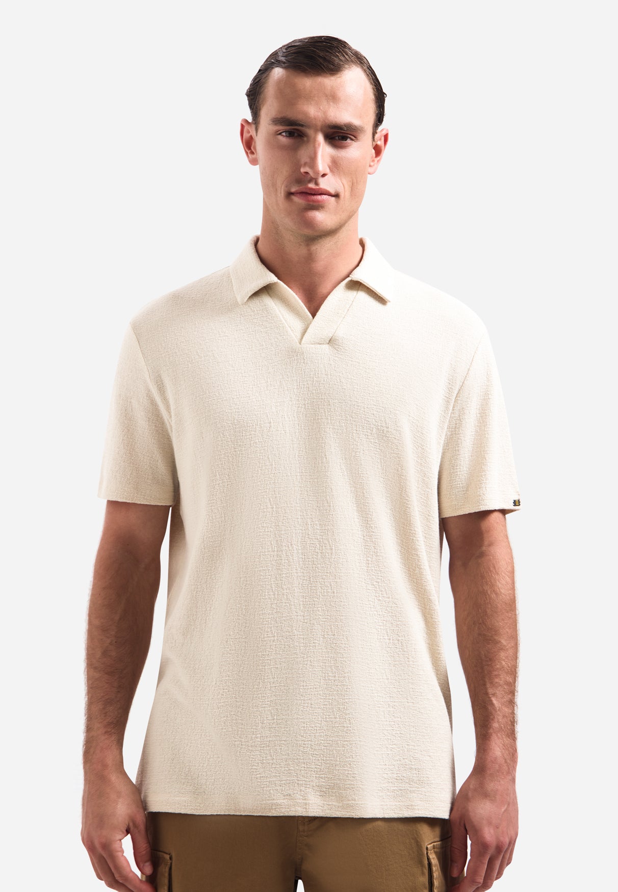 Textured V-hals polo met korte mouwen | Stone