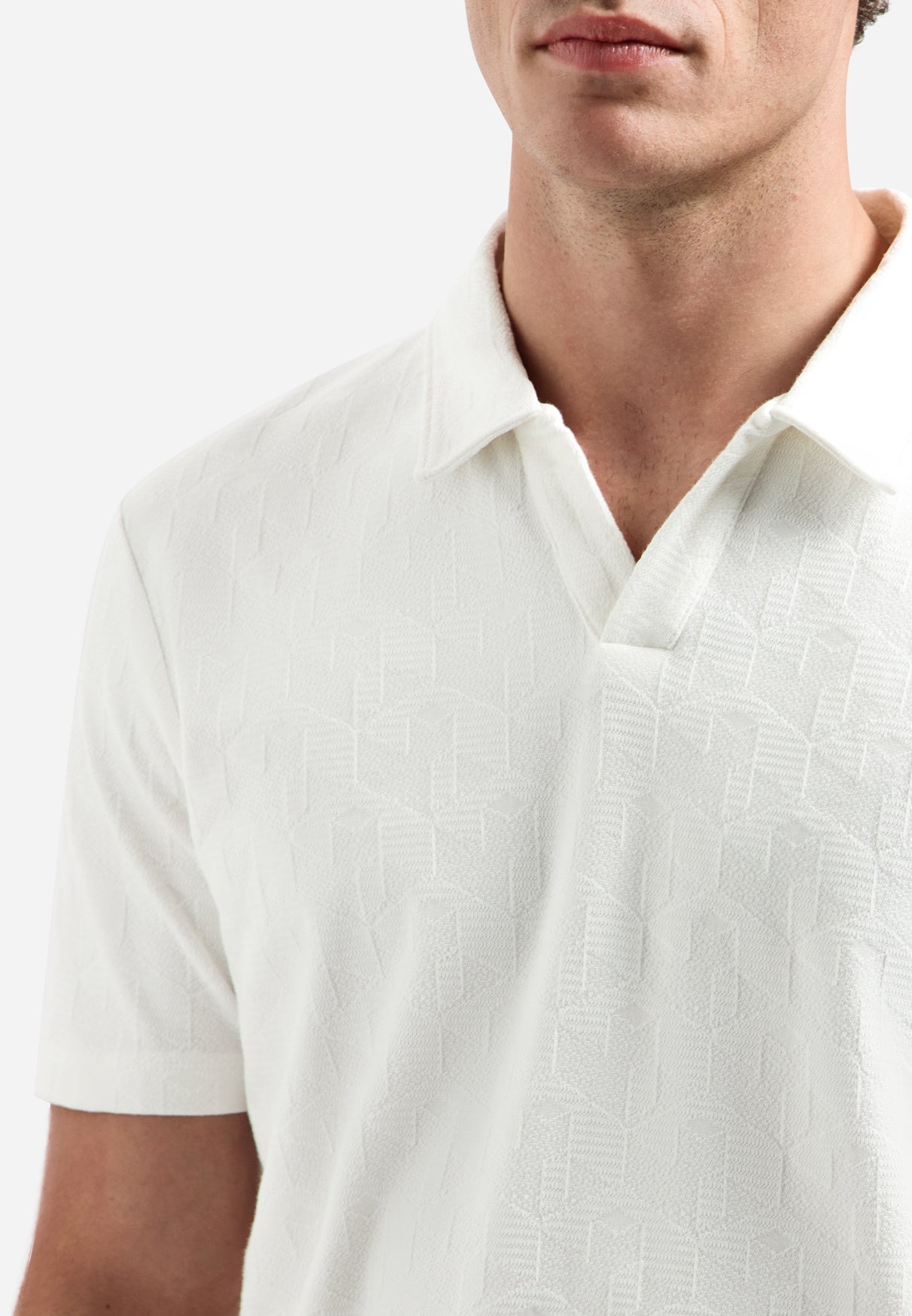 V-hals polo met korte mouwen en jacquardprint | Wit